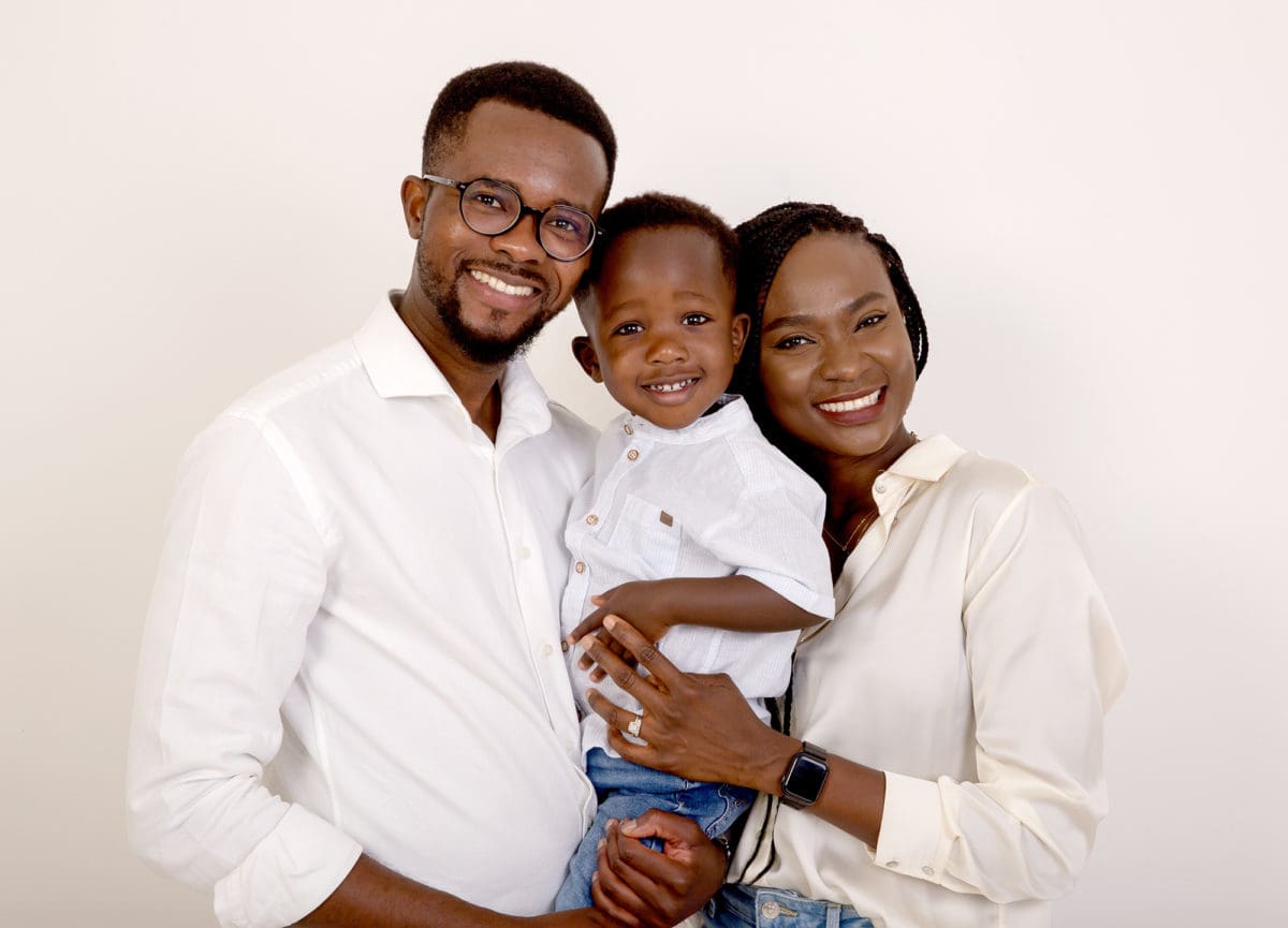 Happy family group at a portrait photography studio session