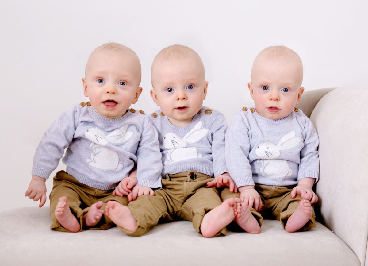 The three brothers from Triplet Tales photographed together in a children’s portrait photo session