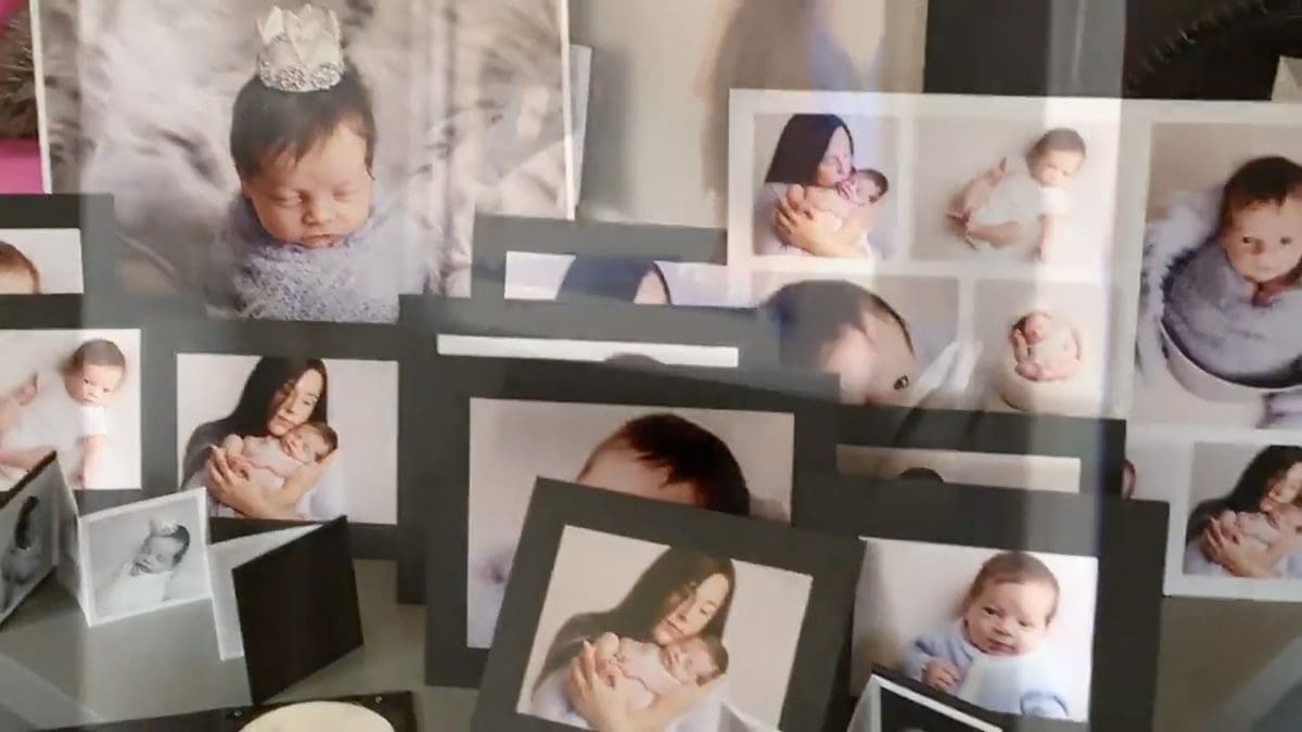 Video poster frame of mum collecting her picture order from a baby photoshoot at The Picture Box photography studio