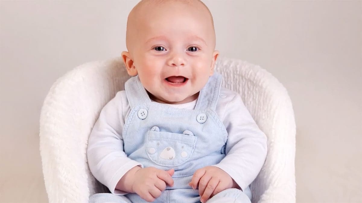 Video poster frame of mum collecting her picture order from a baby photoshoot at The Picture Box photography studio